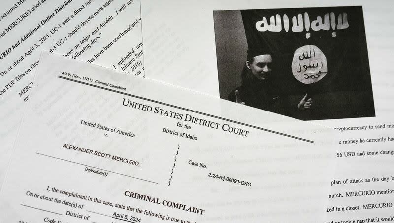 The criminal complaint against Alexander Scott Mercurio is photographed on Tuesday, April 9, 2024. Mercurio, 18, is charged with attempting to provide material support to the Islamic State group after prosecutors said he planned to carry out an attack on a Coeur d'Alene church. Mercurio was arrested Saturday, and the charges were unsealed in Idaho's U.S. District Court on Monday.