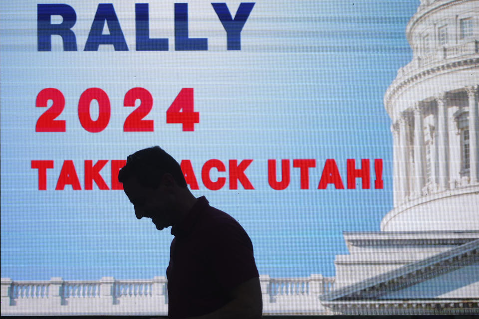 U.S. Senate candidate Trent Staggs walks off stage after speaking with supporters during a rally on June 14, 2024, in Orem, Utah. Staggs waved a "Utah for Trump" flag during the campaign rally in his latest reminder to Utah voters that he's backed by the former president in the race to replace U.S. Sen. Mitt Romney. (AP Photo/Rick Bowmer)