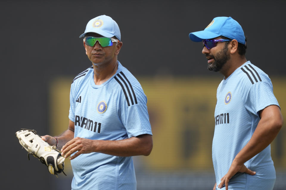 India's captain Rohit Sharma and coach Rahul Dravid chat before Asia Cup final cricket match between India and Sri Lanka in Colombo, Sri Lanka, Sunday, Sep. 17, 2023. (AP Photo/Eranga Jayawardena)