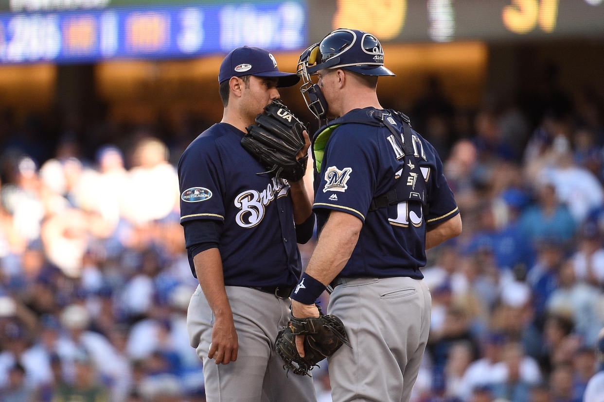 While they have no direct evidence, the Brewers suspect the Dodgers are using video to steal their signs in the NLCS. (Getty Images)