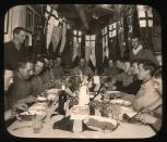 Scott’s birthday dinner on 6 June, 1911. They dined on seal soup, roast mutton, red currant jelly, fruit salad and chocolate. ©H Ponting photograph, Canterbury Museum, New Zealand.