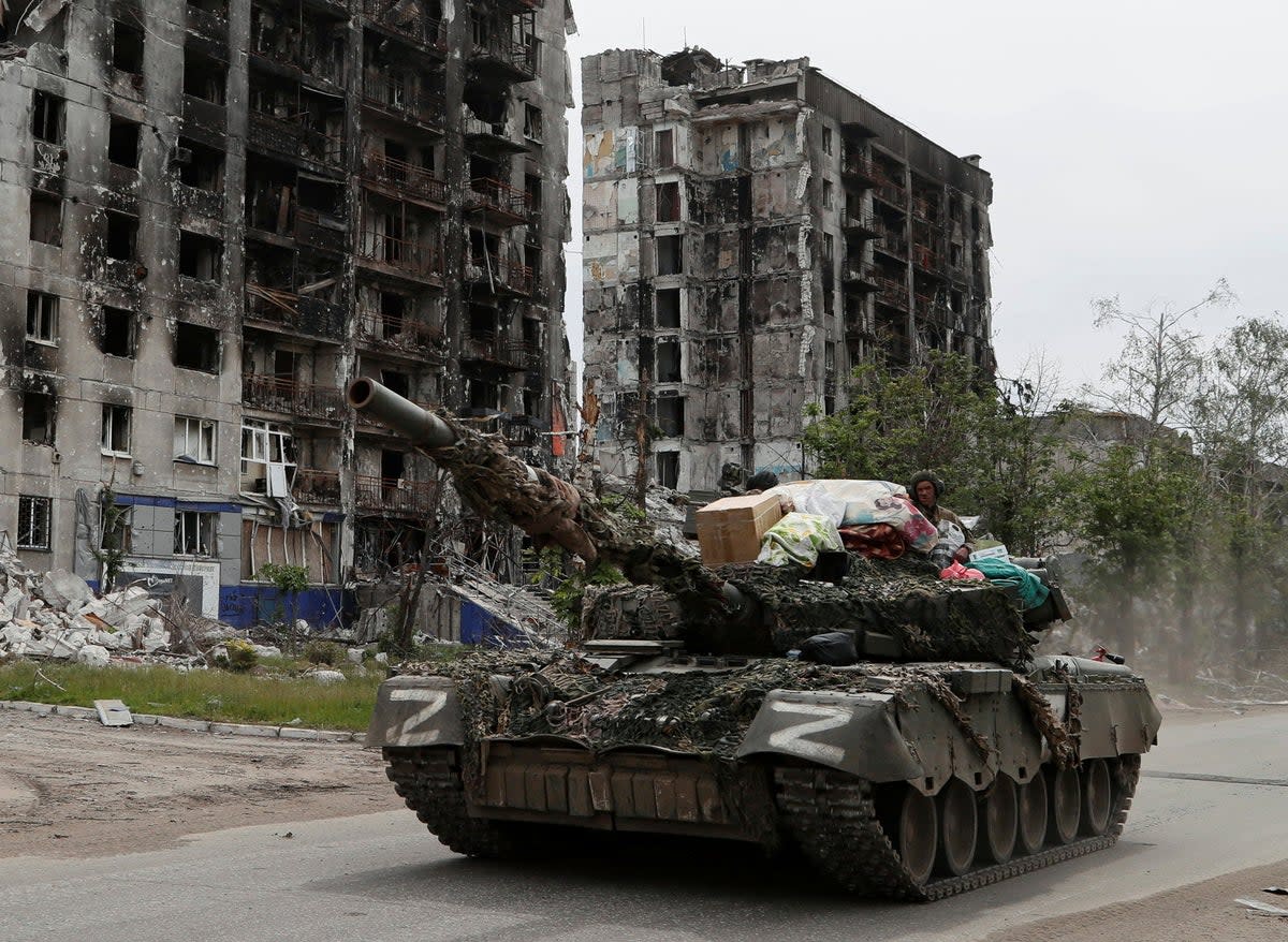 Alina Koreniuk claims that this picture shows her looted boiler and other items from her home  (REUTERS)