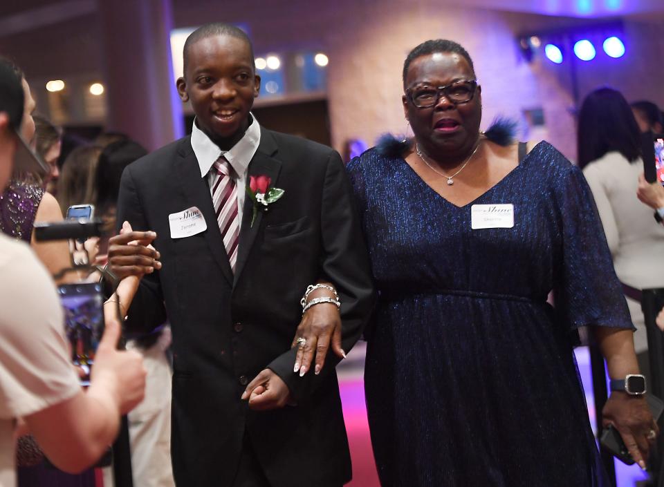 First Baptist Spartanburg joined with the Tim Tebow Foundation to host its annual 'Night to Shine Prom' event for adults with special needs. The event was held at the 'Hangar' in downtown Spartanburg on Feb. 9, 2024. Here, the guests and their escorts 'buddies' walk the Red Carpet.