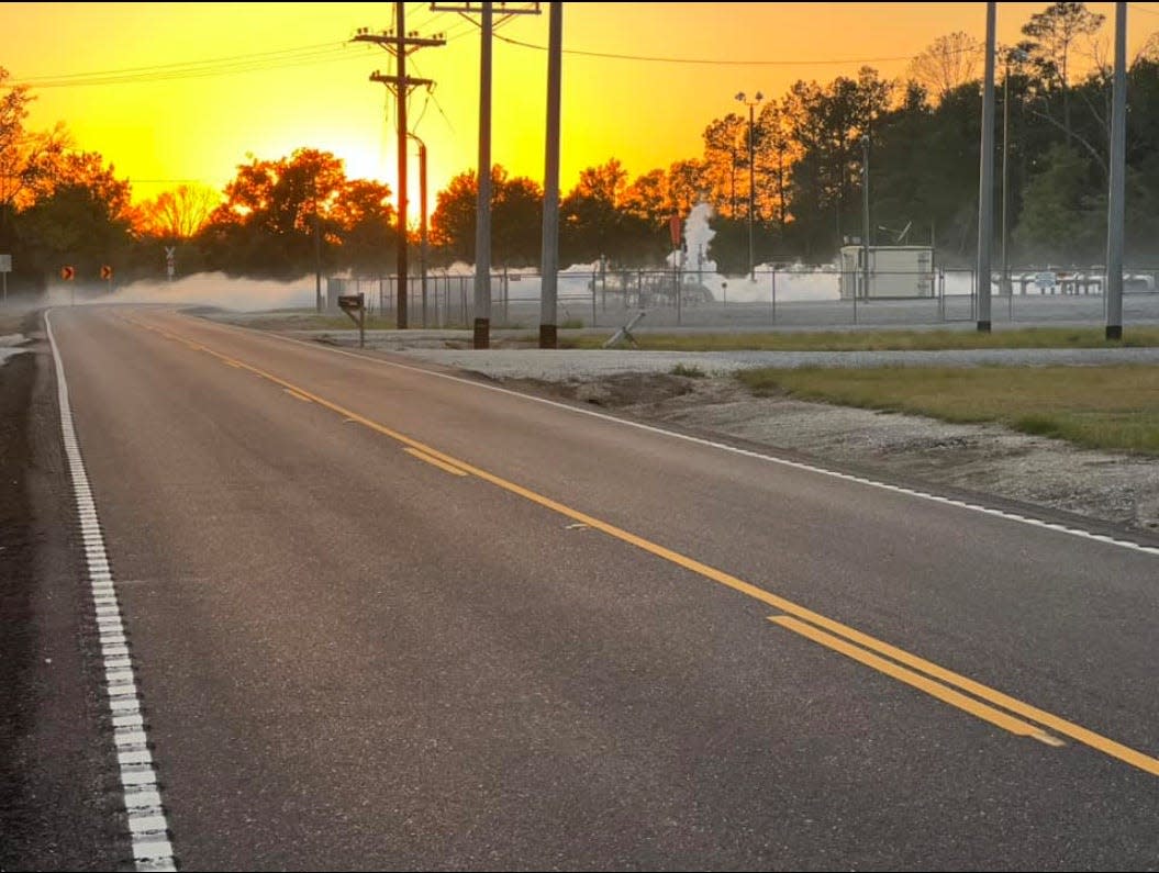 Water vapor drifts over a road during a carbon dioxide leak from a CO2 pipeline near Sulphur in southwest Louisiana on April 3.
