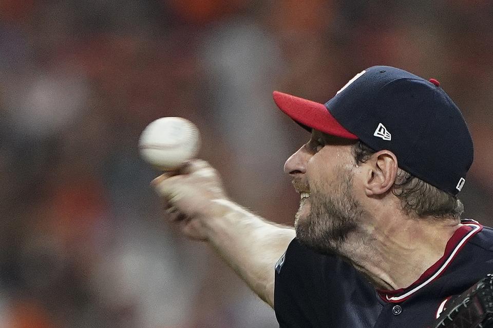 Washington Nationals starting pitcher Max Scherzer throws during the fifth inning of Game 1 of the baseball World Series against the Houston Astros Tuesday, Oct. 22, 2019, in Houston. (AP Photo/David J. Phillip)