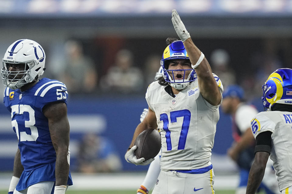 Los Angeles Rams wide receiver Puka Nacua (17) celebrates after a reception as Indianapolis Colts linebacker Shaquille Leonard looks on, left, during the first half of an NFL football game, Sunday, Oct. 1, 2023, in Indianapolis. (AP Photo/Darron Cummings)