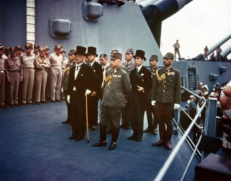 FILE PHOTO: Japanese representatives attend the surrender ceremonies onboard the U.S. Navy battleship USS Missouri in Tokyo Bay