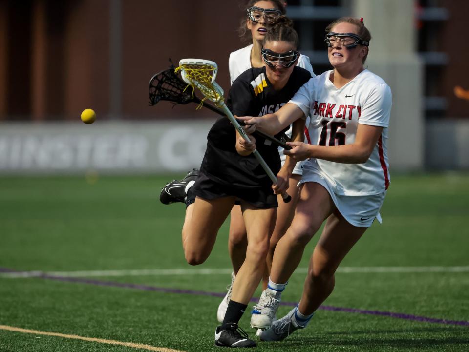 Wasatch’s Kaia Anderson and Park City’s Phebe Marsland compete for the ball in a 5A girls lacrosse semifinal game at Westminster College in Salt Lake City on Tuesday, May 23, 2023. | Spenser Heaps, Deseret News