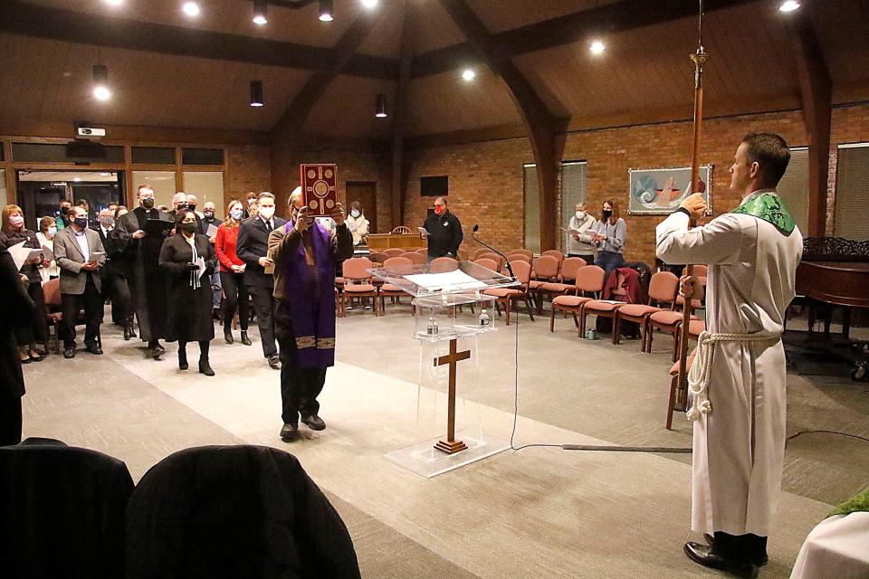 The processional enters the chapel for the ecumenical prayer service held at Ashland Theological Seminary's Ronk Memorial Chapel on Tuesday, Jan. 18, 2022.