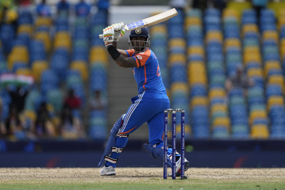 India's Suryakumar Yadav watches the ball after playing a shot during the ICC Men's T20 World Cup cricket match between Afghanistan and India at Kensington Oval in Bridgetown, Barbados, Thursday, June 20, 2024. (AP Photo/Ricardo Mazalan)