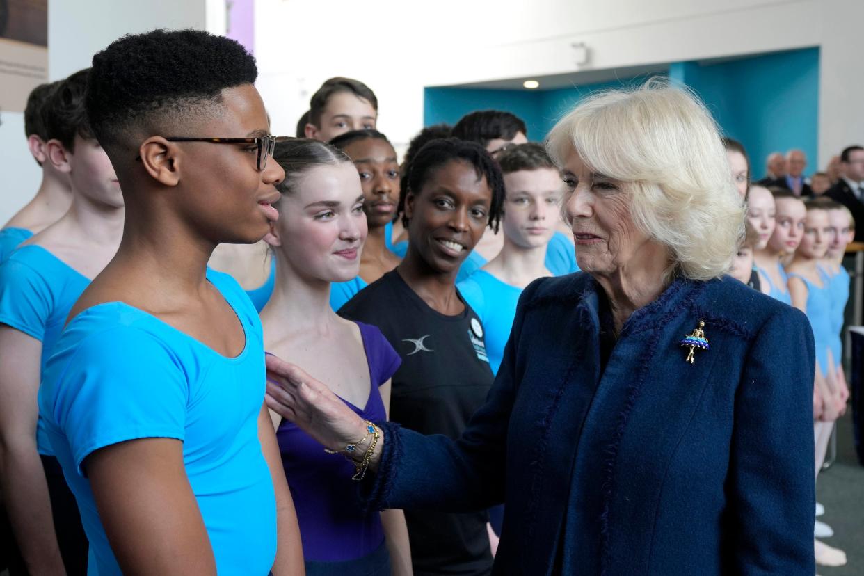 The Queen Consort meets Nigerian dancer Anthony Madu, who won a scholarship after a video of him dancing in Lagos went viral, during a visit to the Elmhurst Ballet School in Birmingham (PA)