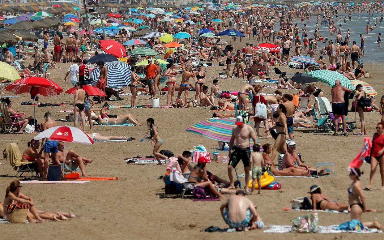 A crowded beach in Valencia - Kai FÃrsterling/EPA-EFE/Shutterstock 