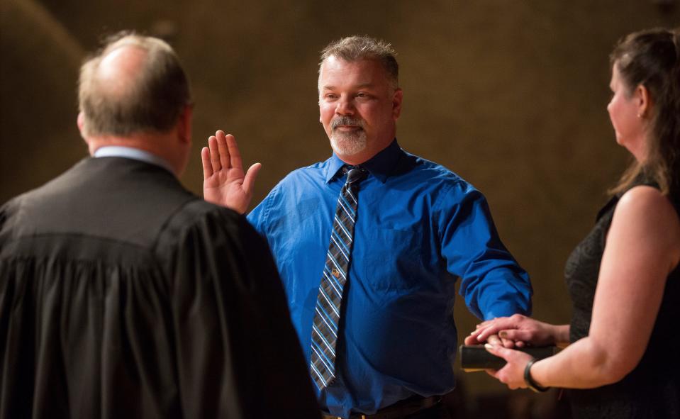 Troy Ingram is sworn-in as a member of Muncie City Council in December 2019. He is now suing to see if he can win a place back on the Republican ballot this spring.