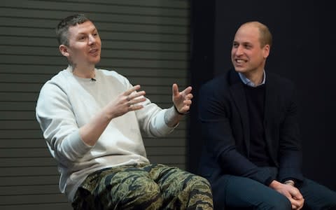 Professor Green, pictured here with Prince William taking part in an assembly at Burlington Academy on school bullying for Mental Health Week. - Credit: PA