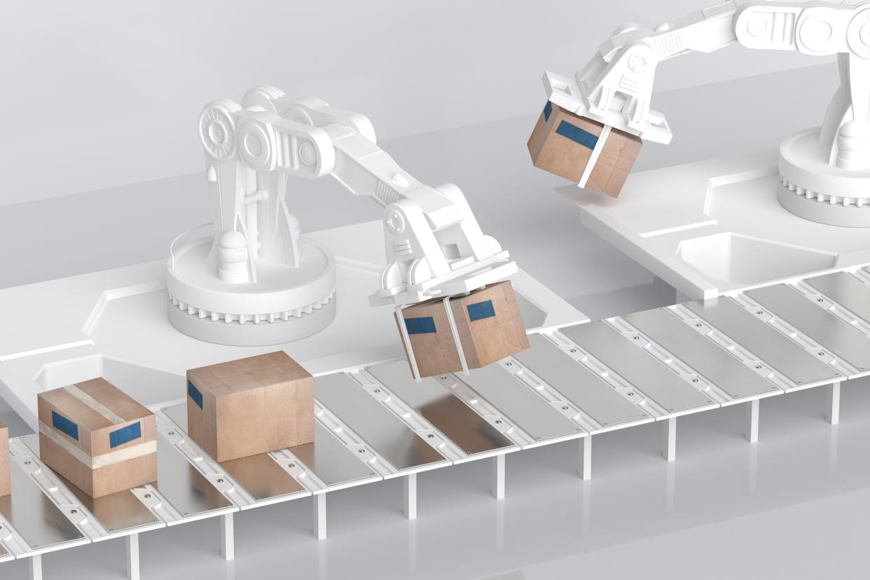 Digital generated image of collaboration of robotic arms taking boxes from conveyor belt.