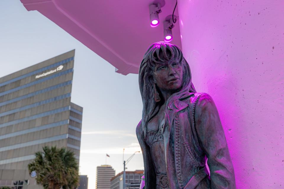 New color-changing lighting installed at the miradors along Corpus Christi’s seawall illuminate the structures with peach, purple, green and blue hues.