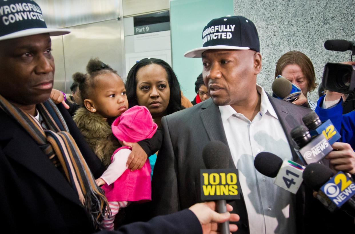 <span>Derrick Hamilton, his wife Nicole, their daughter Maya, two, and supporter Kevin Smith, outside a courtroom after his exoneration on 9 January 2015 in New York.</span><span>Photograph: Bebeto Matthews/AP</span>