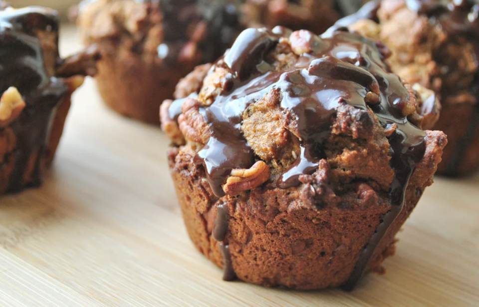 <p>Sanura Weathers</p><p>Inspired by the flavors of warm spice tea and bitter coffee you find in a "dirty chai" drink, these muffins are also sweetly topped with a generous drizzle of bittersweet chocolate ganache. </p><p><strong>Get the recipe: <em><a href="https://parade.com/211444/sanuraweathers/dirty-chai-pumpkin-muffins-with-chocolate-ganache/" rel="nofollow noopener" target="_blank" data-ylk="slk:Dirty Chai Pumpkin Muffins with Chocolate Ganache;elm:context_link;itc:0;sec:content-canvas" class="link ">Dirty Chai Pumpkin Muffins with Chocolate Ganache</a></em></strong></p>