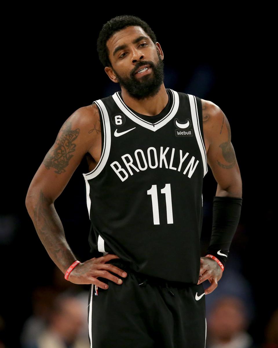 Kyrie Irving reacts during a game against the New Orleans Pelicans at Barclays Center on Oct. 19, 2022.