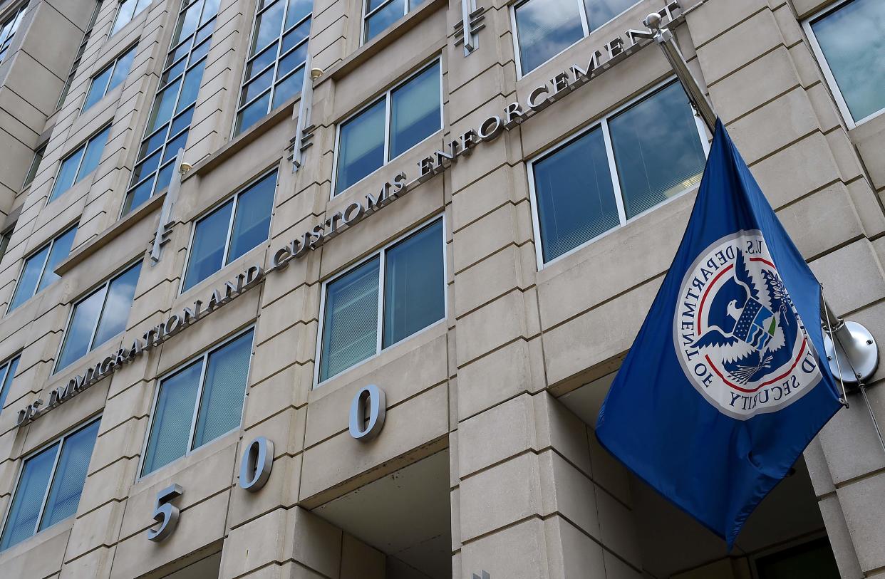 In this file photo taken on July 17, 2020 the Department of Homeland Security flag flies outside the Immigration and Customs Enforcement (ICE) headquarters in Washington, D.C.