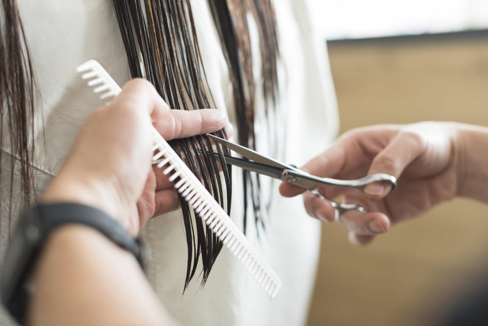 wet hair getting cut