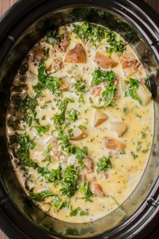 <p>The Magical Slow Cooker</p><p>Just like Olive Garden's famous recipe! Filled with sausage, potatoes and kale.</p><p><strong>Get the Recipe: <a href="https://www.themagicalslowcooker.com/slow-cooker-zuppa-toscana/" rel="nofollow noopener" target="_blank" data-ylk="slk:Crock Pot Zuppa Toscana;elm:context_link;itc:0;sec:content-canvas" class="link rapid-noclick-resp">Crock Pot Zuppa Toscana</a></strong></p>