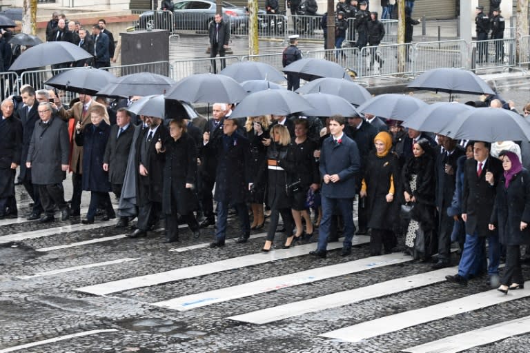 World leaders arrive at the Arc de Triomphe in Paris on November 11, 2018 to attend a ceremony as part of commemorations marking the 100th anniversary of the 11 November 1918 armistice ending World War I