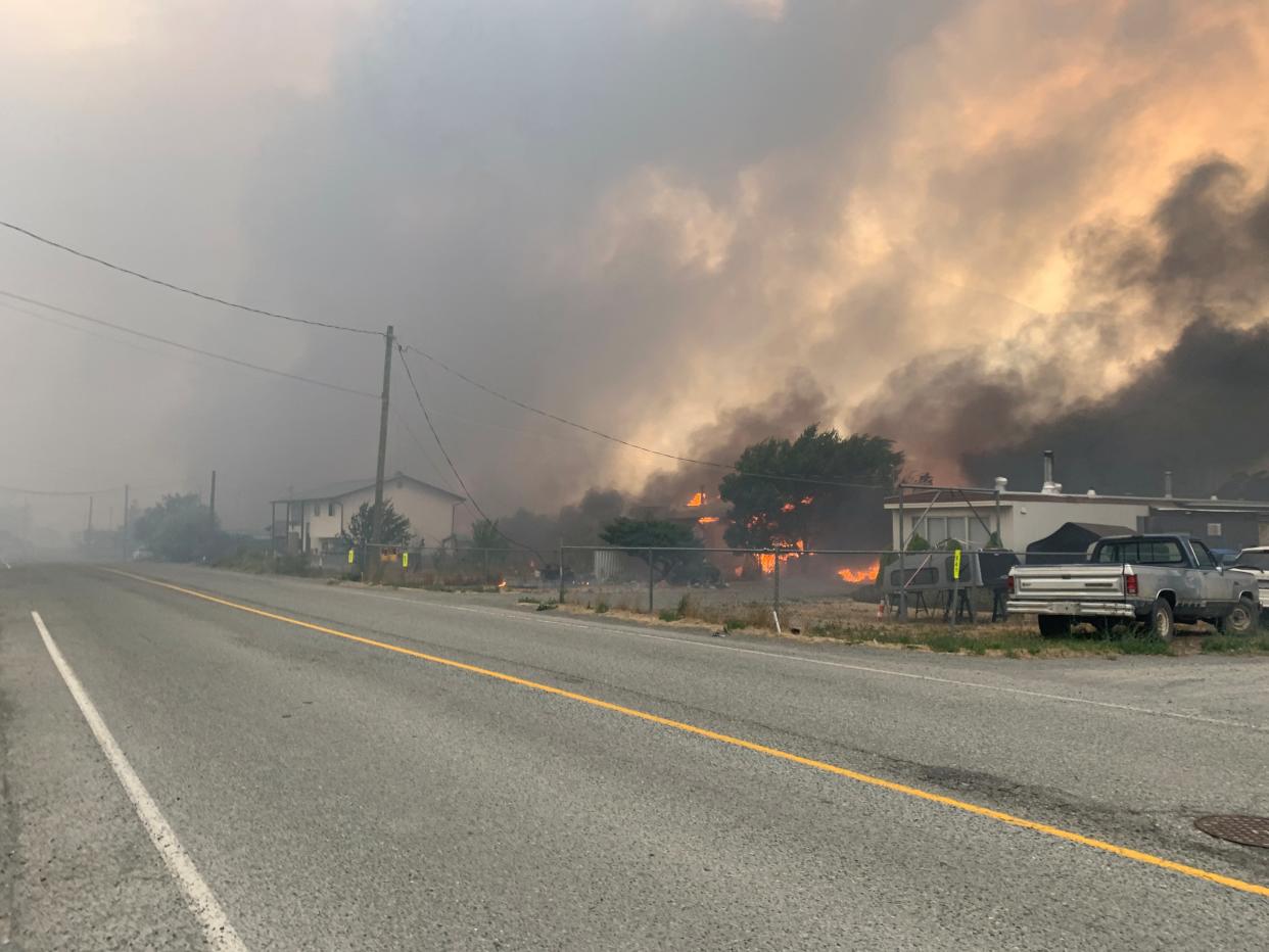 Smoke rises above the small western Canadian town of Lytton after wildfires forced its residents to evacuate, in Lytton, British Columbia, Canada 30, 2021.  (via REUTERS)