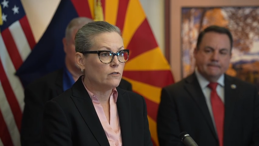 Arizona Gov. Katie Hobbs and Yuma Mayor Douglas Nicholls talk about the upcoming end of Title 42 at the state Capitol in Phoenix on May 8, 2023.