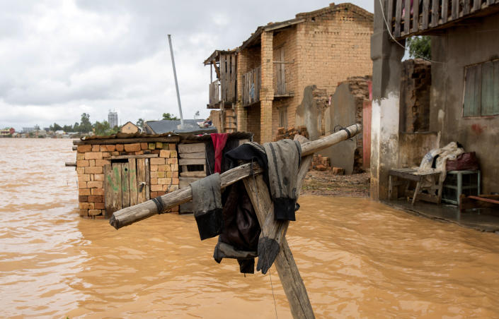 Residential streets flooded with rain water in Antananarivo, Madagascar, Saturday, Jan. 28, 2023. A tropical storm Cheneso made landfall across north-eastern Madagascar on January 19, brought strong winds to coastal regions, while heavy rain brought significant flooding to northern parts of the country. (AP Photo/Alexander Joe)