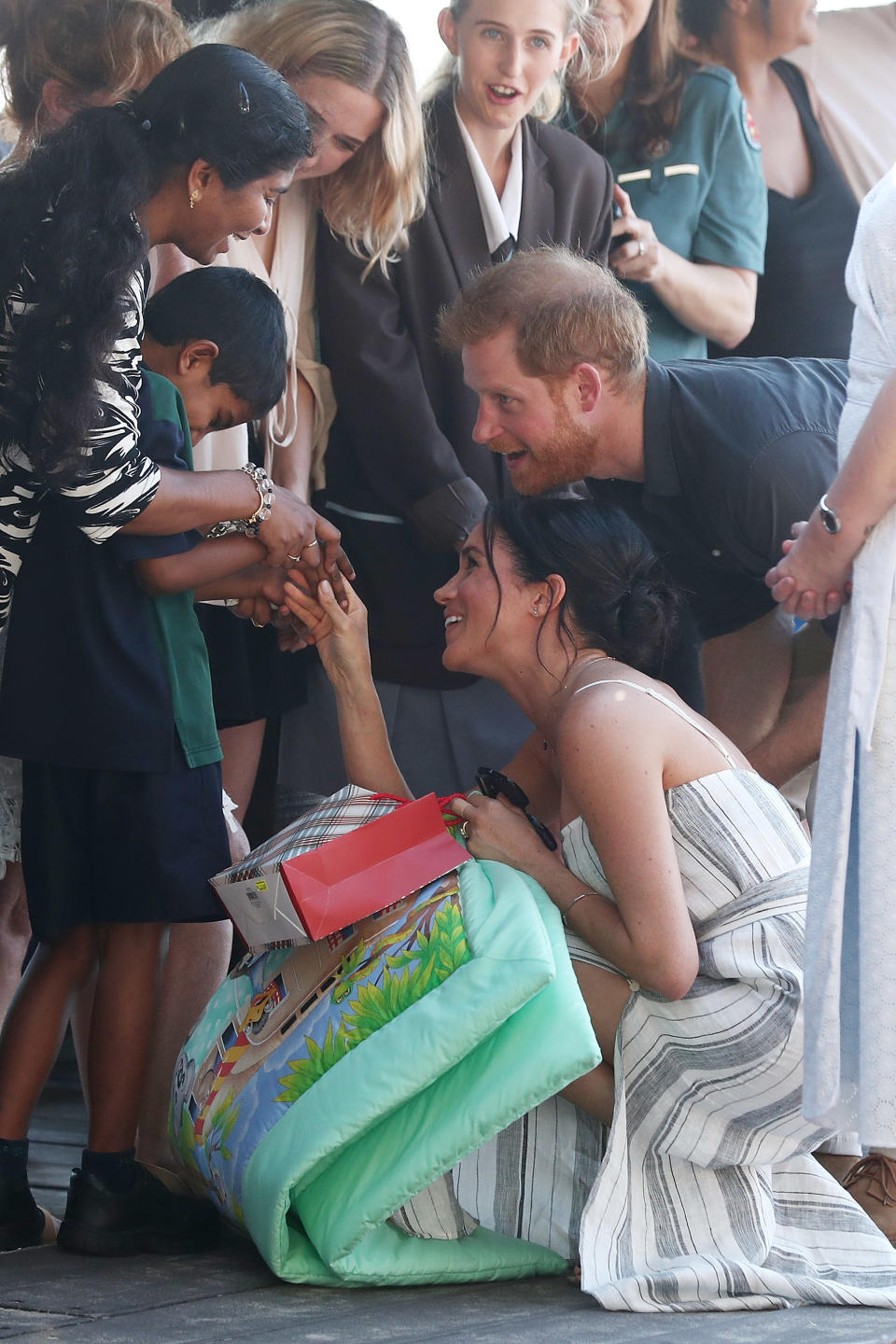 <p>Later, Prince Harry was joined at Kingfisher Bay Jetty by his wife, Meghan Markle.Photo: Getty Images </p>