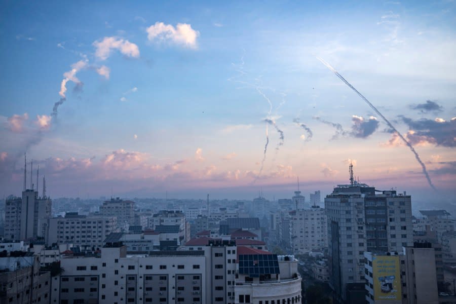 Rockets are fired toward Israel from Gaza, Saturday, Oct. 7, 2023. (AP Photo/Fatima Shbair)