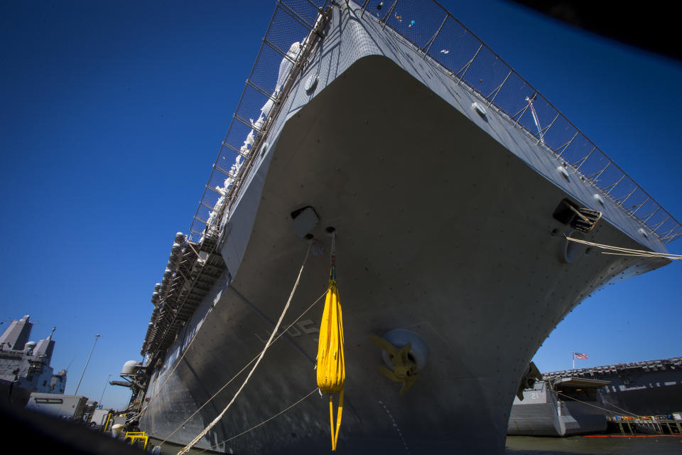 The Wasp-class USS Bataan is docked at Norfolk Naval Station Norfolk, Va., on Wednesday, March 15, 2023. The amphibious assault ship carries four chaplains and a civilian counselor on board during deployment. (AP Photo/John C. Clark)