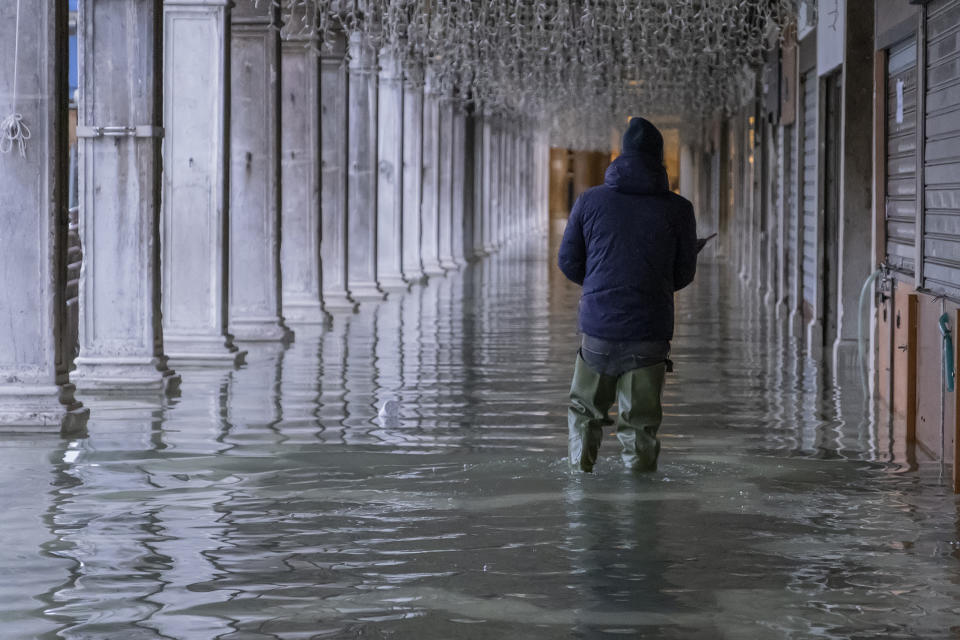 VENICE, ITALY - NOVEMBER 24: Local walks in Piazza San Marco on November 24, 2019 in Venice, Italy. Ten days after the exceptional and disastrous high tide today once again it reached 130 cm. (Photo by Stefano Mazzola/Awakening/Getty Images)