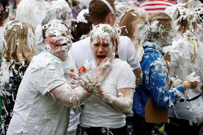 <p>Students from St Andrews University are covered in foam as they conclude the traditional “Raisin Weekend” on Lower College Lawn, at St Andrews, Scotland, Oct. 23, 2017. (Photo: Russell Cheyne/Reuters) </p>