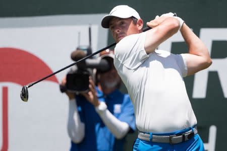 Jun 21, 2018; Cromwell, CT, USA; Rory McIlroy plays his shot from the first tee during the first round of the Travelers Championship at TPC River Highlands. Mandatory Credit: Bill Streicher-USA TODAY Sports