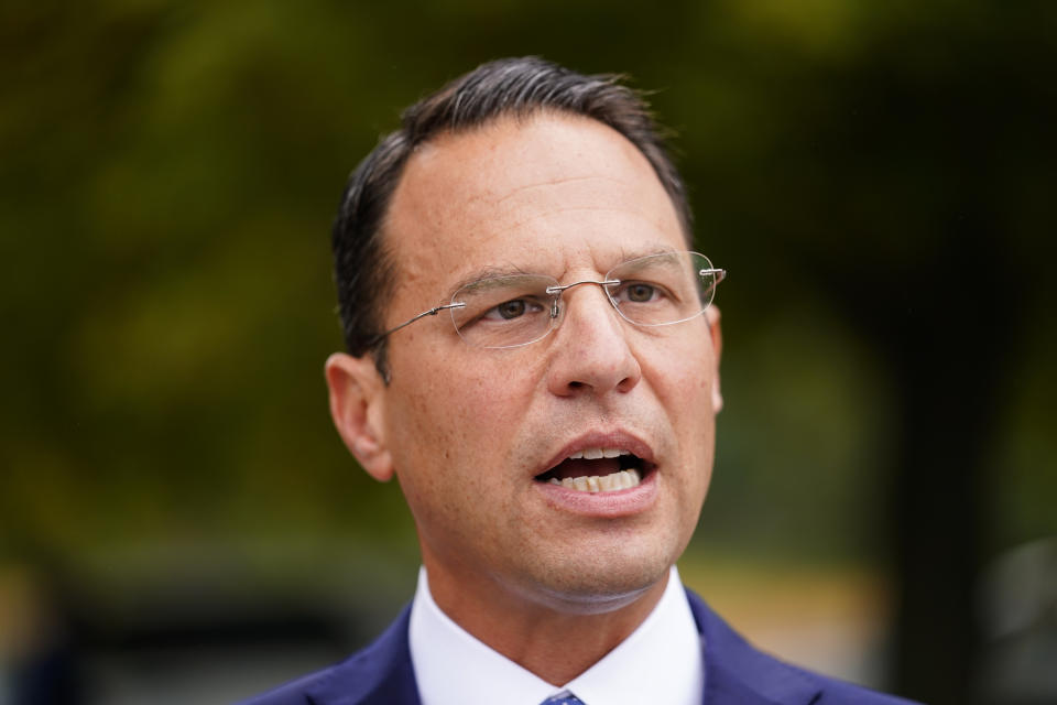 Pennsylvania Attorney General Josh Shapiro speaks with members of the media after a news conference at Marsh Creek State Park in Downingtown, Pa., Tuesday, Oct. 5, 2021. Shapiro filed criminal charges Tuesday against the developer of a problem-plagued pipeline that takes natural gas liquids from the Marcellus Shale gas field to an export terminal near Philadelphia. (AP Photo/Matt Rourke)