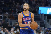 Golden State Warriors guard Stephen Curry (30) prepares to shoot a 3-point basket during the first half of an NBA basketball game against the Orlando Magic in San Francisco, Monday, Dec. 6, 2021. (AP Photo/Jeff Chiu)