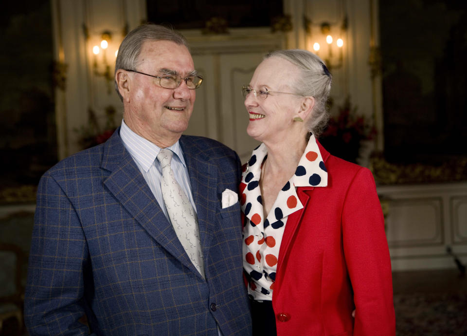 FILE - Denmark's Queen Margrethe II and Price Henrik pose for a photo at Fredensborg Castle in Fredensborg, Denmark Saturday, June 2, 2007. ahead of their their 40th weeding anniversary on June 10. Before Margrethe, 83, announced that she would resign, most royal watchers assumed she would live out her days on the throne, as is tradition in Denmark. Margrethe had showed no signs of wanting to retire from her largely ceremonial position. Until recently, she had insisted that she considered being queen a job for life. (Steen Brogaard, Ritzau Scanpix via AP, File)