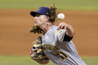 Milwaukee Brewers relief pitcher Josh Hader throws during the ninth inning of a baseball game against the Miami Marlins, Saturday, May 8, 2021, in Miami. The Brewers won 6-2. (AP Photo/Lynne Sladky)