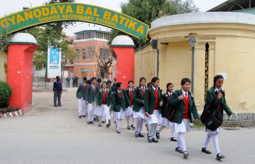 Nepalese Humla children leave their private school to head for home in a suburb of Kathmandu. While their classmates come from the country's wealthiest elite, these children were rescued seven years ago, dirty and sick, from a cowshed on the edge of the capital