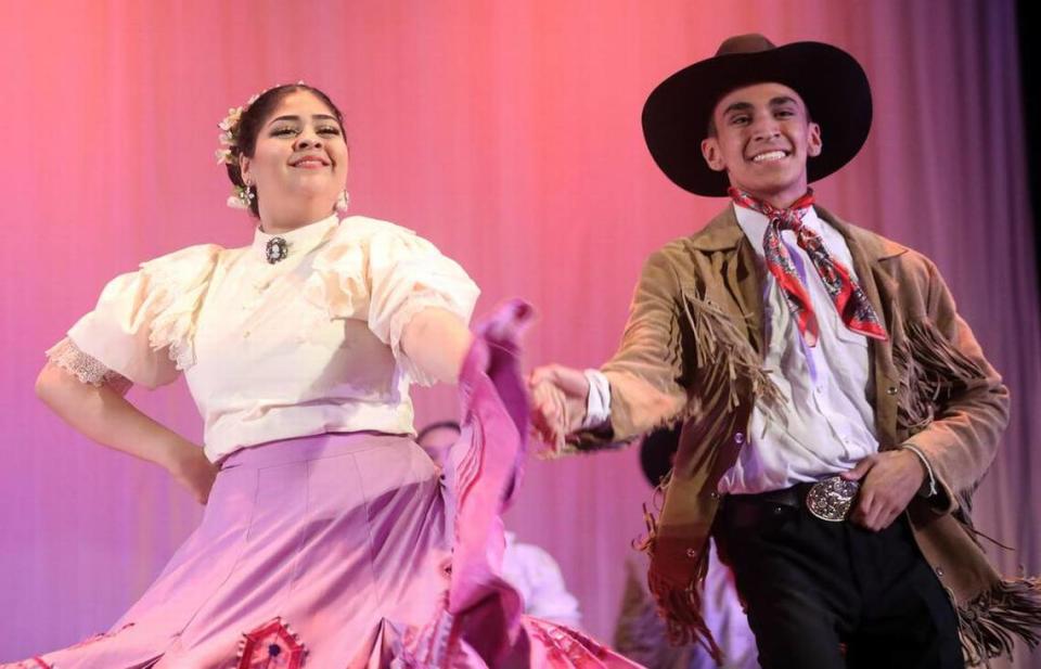 Yamila Mercado and Ezekiel Flores perform polkas from Nuevo León at the Central East Danzantes de Tláloc 25th anniversary show at the Performing Arts Center on May 26, 2023.