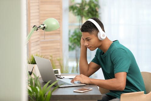   <span class="attribution"><a class="link " href="https://www.shutterstock.com/image-photo/africanamerican-teenage-boy-headphones-using-laptop-1346023922" rel="nofollow noopener" target="_blank" data-ylk="slk:New Africa/Shutterstock;elm:context_link;itc:0;sec:content-canvas">New Africa/Shutterstock</a></span>