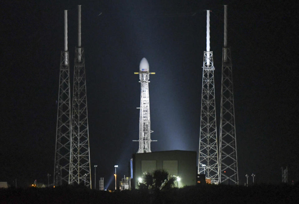 A SpaceX Falcon 9 rocket sits on the pad at Cape Canaveral Air Force Station Wednesday, May, 15, 2019. Launch of the rocket, carrying 60 Starlink internet communications satellites, was scrubbed due to upper-level winds.
