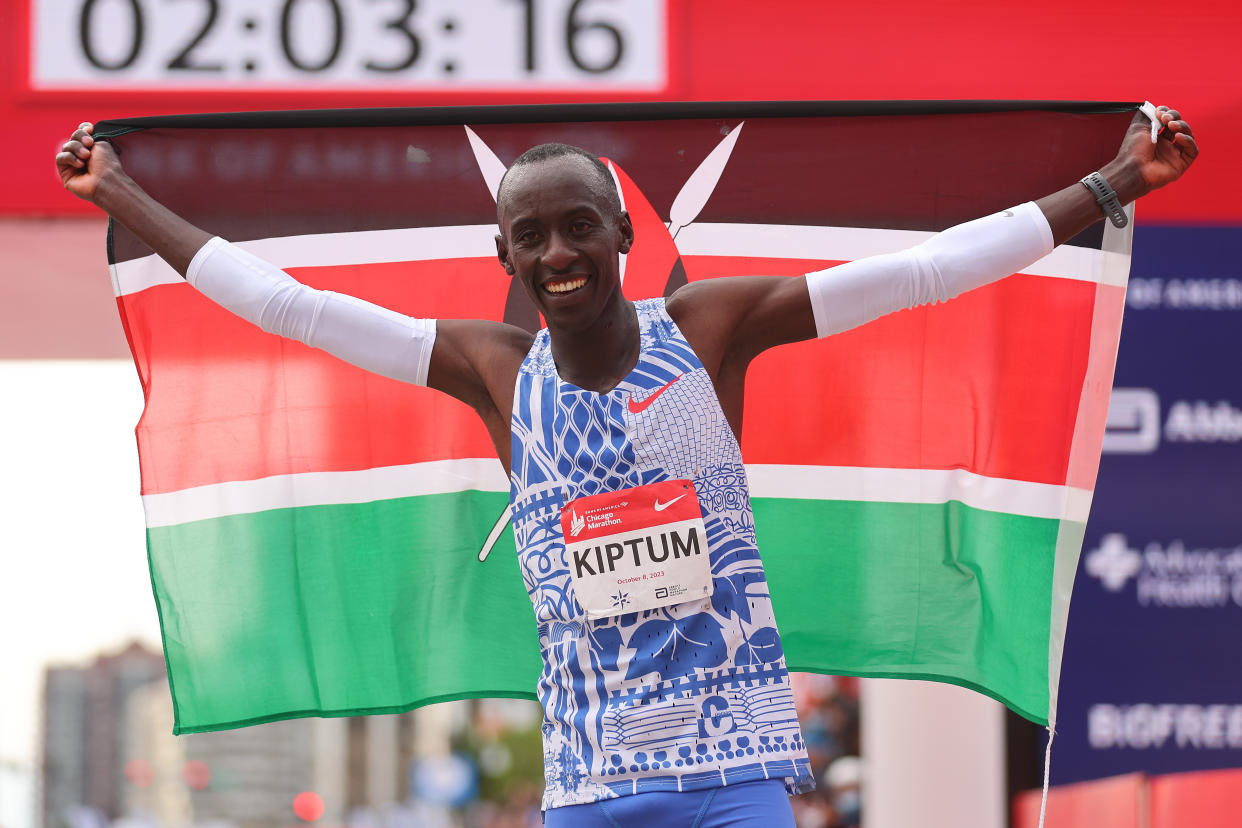 CHICAGO, ILLINOIS - OCTOBER 08: Kelvin Kiptum of Kenya celebrates after winning the 2023 Chicago Marathon professional men's division and setting a world record marathon time of 2:00.35 at Grant Park on October 08, 2023 in Chicago, Illinois. (Photo by Michael Reaves/Getty Images)