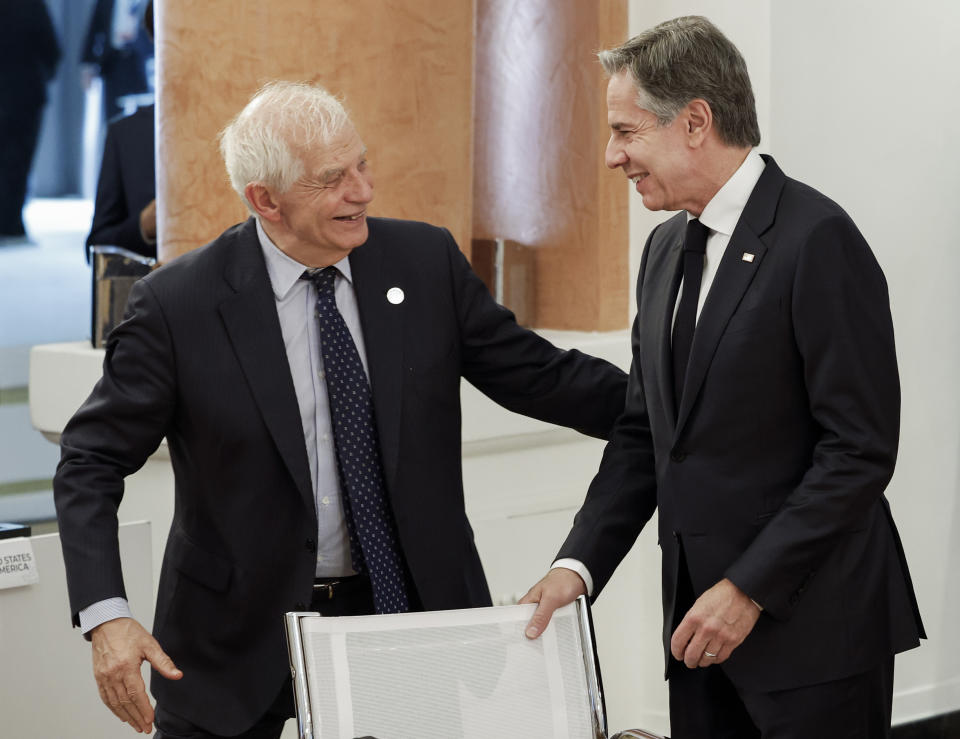 European Union foreign policy chief Josep Borrell and U.S. Secretary of State Antony Blinken, right, attend a meeting on the second day of a G7 foreign ministers meeting on Capri island, Italy, Thursday April 18, 2024. (Remo Casilli/Pool via AP)