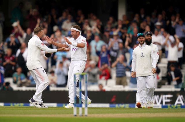 Stuart Broad celebrates taking the wicket of Australia's Todd Murphy