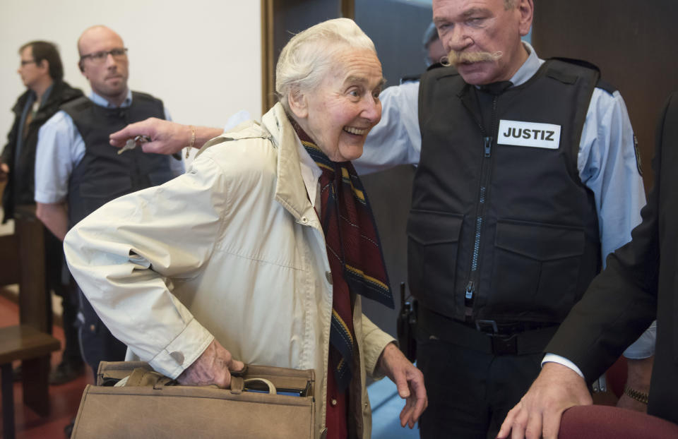 In this Nov. 23, 2017 photo Ursula Haverbeck, accused of hate speech, enters the court room of the District Court in Detmold, Germany. Germany’s highest court has thrown out a notorious elderly neo-Nazi’s case against her conviction for Holocaust denial, ruling that her activities are not covered by a constitutional guarantee of freedom of expression. (Bernd Thissen/dpa via AP, file)