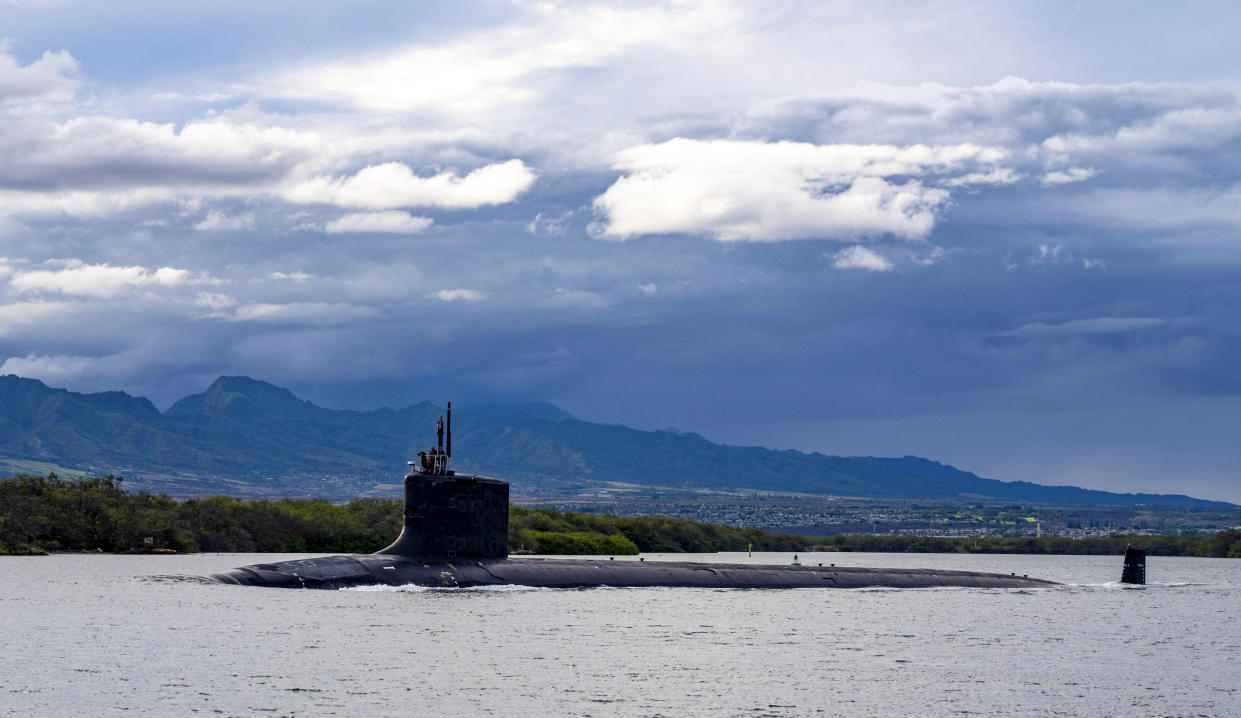 In this photo provided by U.S. Navy, the Virginia-class fast-attack submarine USS Missouri (SSN 780) departs Joint Base Pearl Harbor-Hickam for a scheduled deployment in the 7th Fleet area of responsibility, Sept. 1, 2021. Australia decided to invest in U.S. nuclear-powered submarines and dump its contract with France to build diesel-electric submarines because of a changed strategic environment, Prime Minister Scott Morrison said on Thursday, Sept. 16, 2021.(Chief Mass Communication Specialist Amanda R. Gray/U.S. Navy via AP)