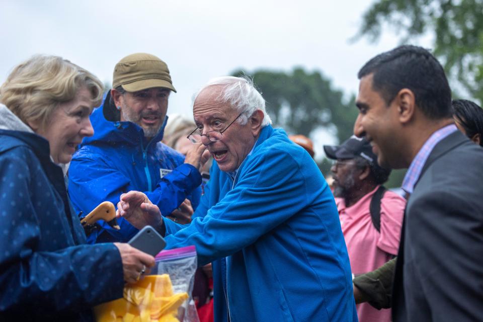 Vermont U.S. Sen. Bernie Sanders excitedly engages with the front row of attendees after giving a speech at a town hall event organized by the Portage County Democrats, Wisconsin Democratic Seniors Council and WisDems Rural Caucus at Pfiffner Pioneer Park in Stevens Point, Wis. on Friday, June 28, 2024.